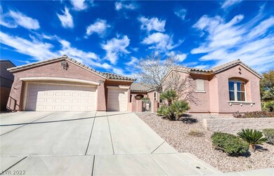 Wide driveway and view of the gate entry into the