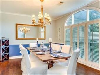 The Dining Room is open to the foyer and den