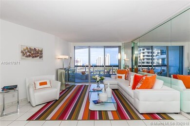 Spacious living room with direct ocean views.