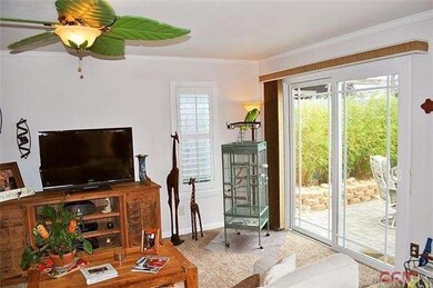 Living Room with slider out to courtyard