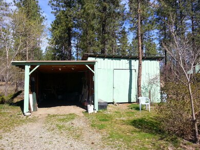 Detached Carport with Shed