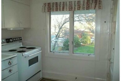 Kitchen. Pella Roll-Screen windows overlooking bac