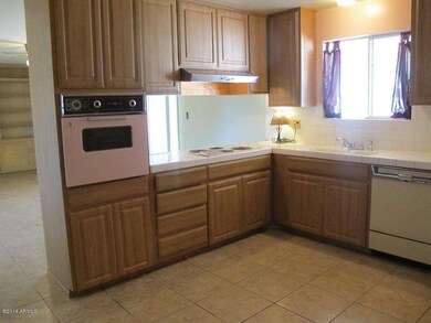 Kitchen w newer Cabinets and tile floors
