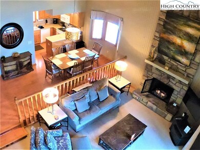 Cozy living room as viewed from upper level.
