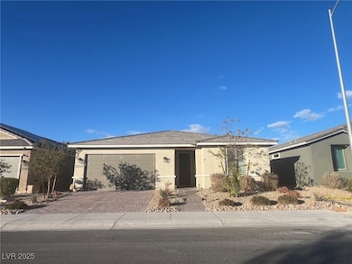 Ranch-style home featuring stucco siding, decorati
