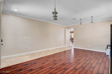 Living room/dining area with wood-type flooring, c