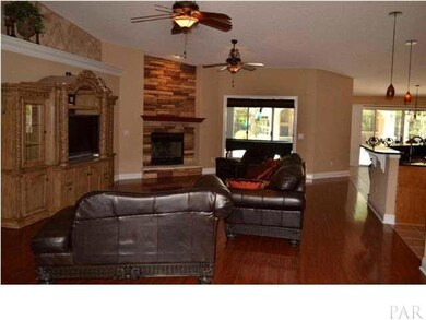 Huge Great Room With Stacked Stone Fireplace