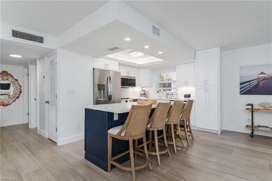 Living area with light wood-style flooring