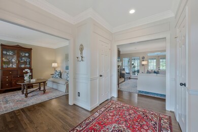 Entrance with Formal Living Room or Study on Left and Living Room straight through Center door