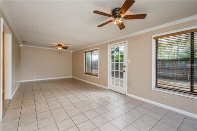 27x11 Family Room with tile floors and crown moldi