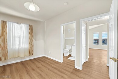 Unfurnished bedroom with visible vents, baseboards