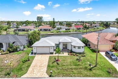 Aerial perspective home with canal/intersection wa