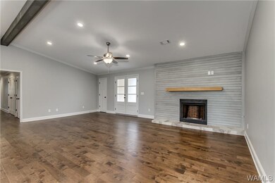 Vaulted ceiling, recessed lights, hardwood floors,