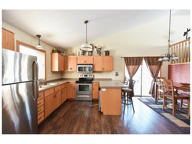 Main level features kitchen & dining area.