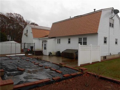 Exterior Back. Trek Decking and Raised Garden Beds