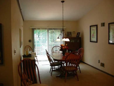 Dining Room. Vaulted ceilings offer a nice open fe
