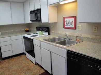 New Granite and White Painted Cabinets In This Che