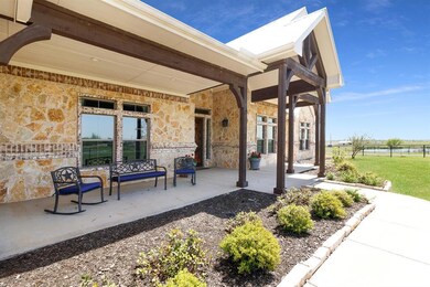 Enjoy Coffee on the Front Porch looking out to the Pond