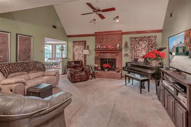 Spacious room with feature brick fireplace, vaulte