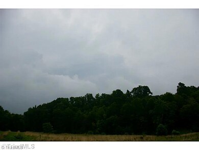 Remarks. View of hill side above pond from adjoining property.