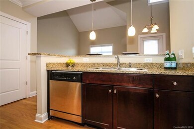 Kitchen with large sink overlooking living space