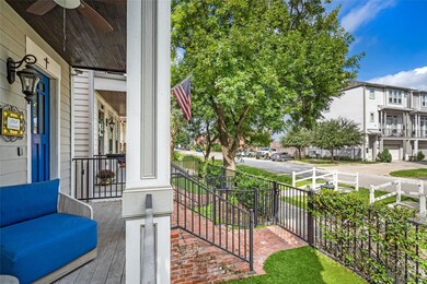 Front porch also has a ceiling fan to keep the bre