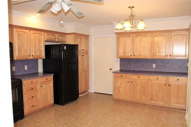 KITCHEN: Huge kitchen with plenty of beautiful woo