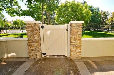 Detail of the gate and wall with stone accents