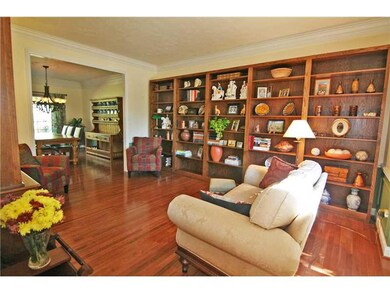 Living Room. With continued hardwood flooring, the