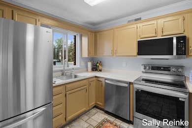 3364 Devonwood Hills NE unit C, Grand Rapids, MI 49525 - photo 2
