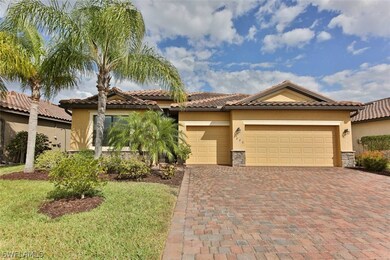 Front of the home with a 3 car garage