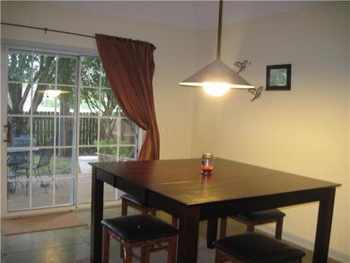 The lovely dining area is open to the family gathe
