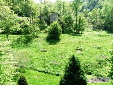 Taken looking toward one of the other homes alread