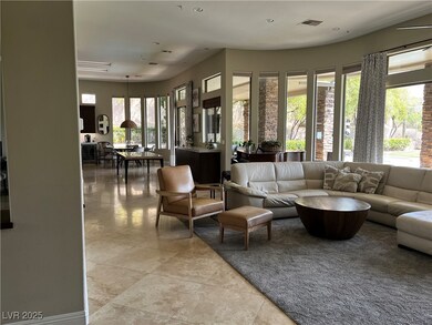 Living area with light tile patterned flooring and