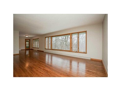 Living Room. Expansive widows provide peaceful, wo