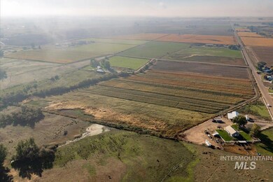 Aerial view of property's location with farmland and rural landscape