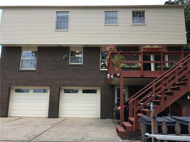 The large private deck off of the family room will