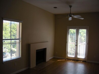 Unfurnished living room with wood finished floors