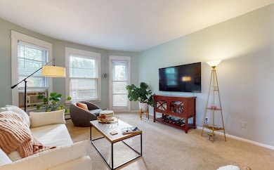 Living room.  All living spaces on one level, including a new in-unit laundry.