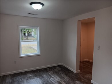 Living room into entry way