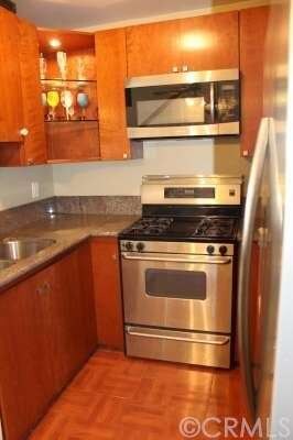 Kitchen with stainless steel appliances
