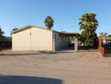 Side of home and rear patio