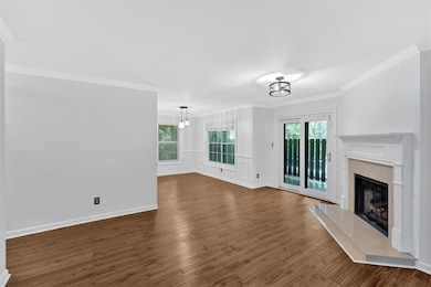 Unfurnished living room featuring a high end firep