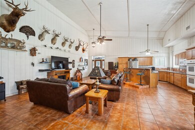 Main living/kitchen/dining area is open concept wi