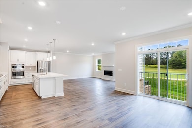 Builder images of a previously built decorated model, finishes, available options, and layout can differ in actual home.