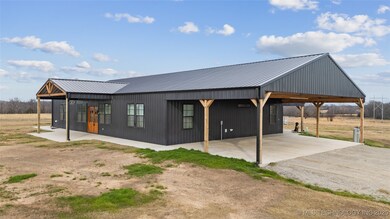 Covered 40' wide carport fits 3 cars