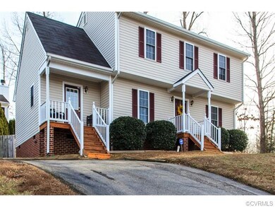 Home sits on a hill. Front side porch is a great p