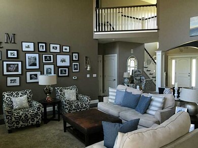 Den/Family/Great Room. Second floor balcony overlo
