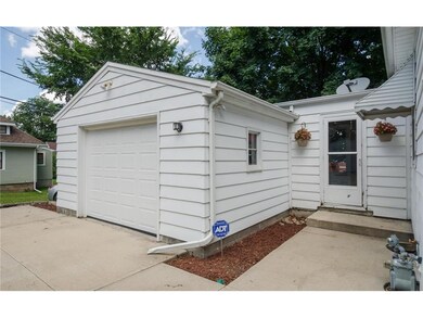 Oversized one stall garage with a breezeway leadin