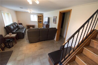 Lower level family room. Tile floors